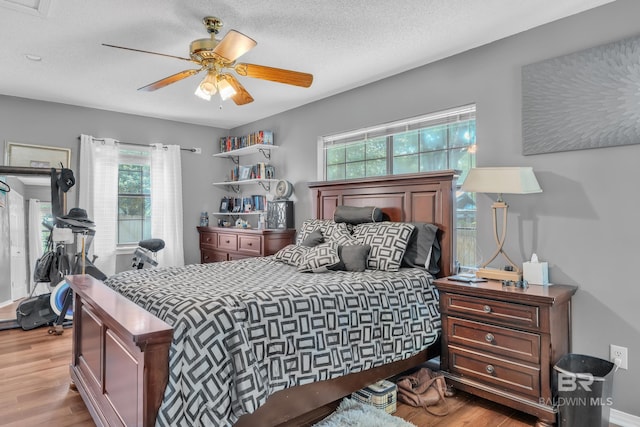 108 Paige Cir, Daphne, AL 36526 - bedroom featuring wood finished floors and a ceiling fan