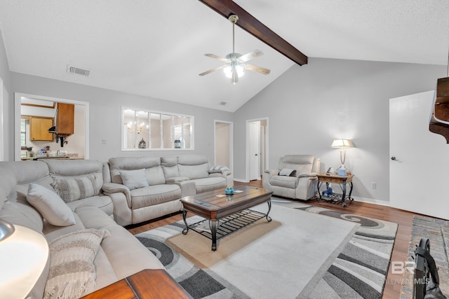 108 Paige Cir, Daphne, AL 36526 - living room with wood finished floors, a ceiling fan, a chandelier, and healthy amount of natural light