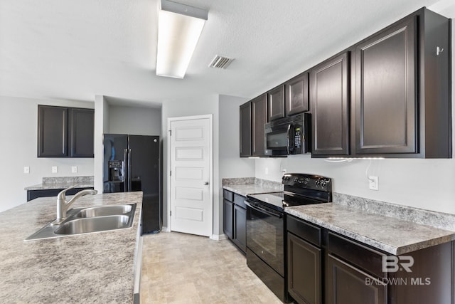 kitchen featuring dark brown cabinetry, a textured ceiling, sink, and black appliances