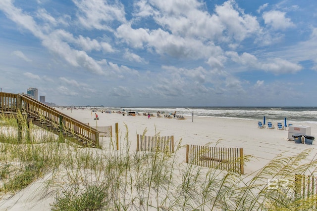 property view of water featuring a beach view