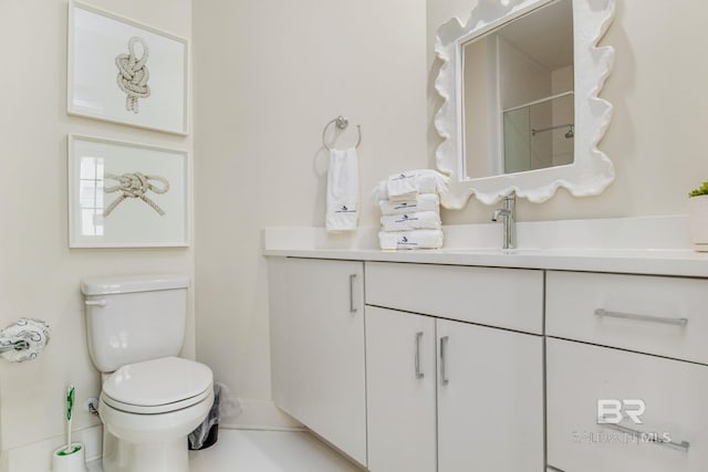 full bathroom featuring vanity, toilet, and tile patterned flooring