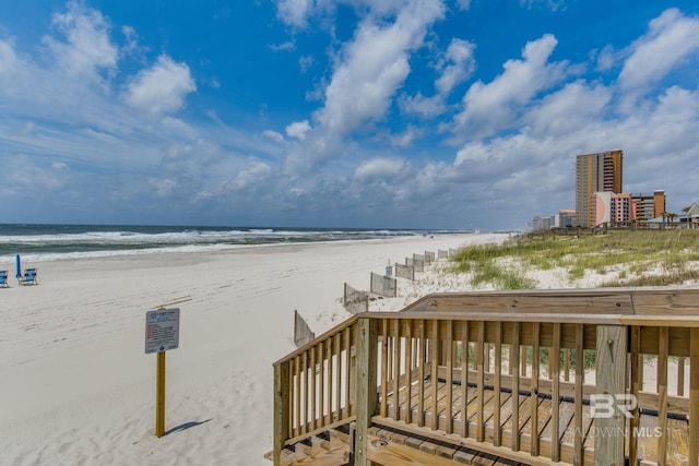 property view of water featuring a beach view