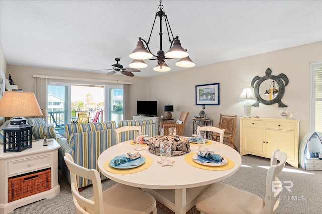 dining area with light colored carpet