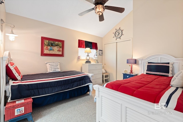 carpeted bedroom featuring lofted ceiling, a closet, and ceiling fan