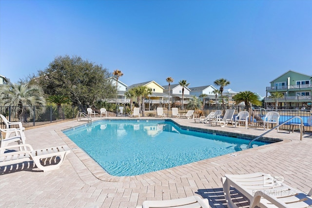 view of swimming pool featuring a patio