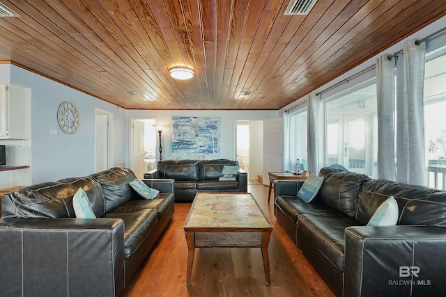 747 Cherokee Rd, Gulf Shores, AL 36542 - living area with wooden ceiling, visible vents, and wood finished floors