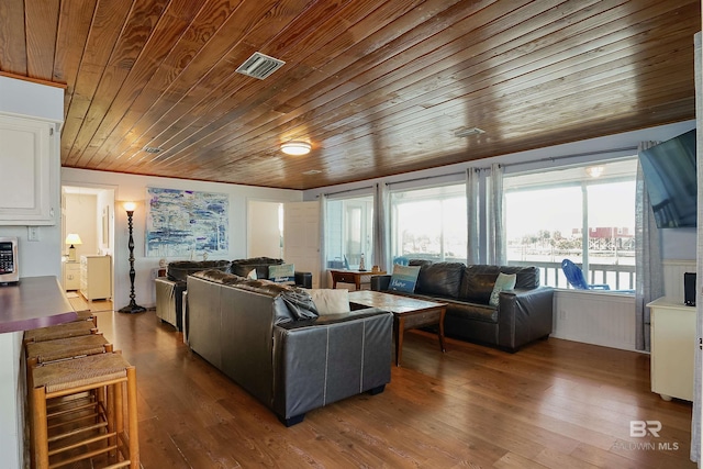 747 Cherokee Rd, Gulf Shores, AL 36542 - living room featuring wooden ceiling, dark wood-style floors, visible vents, and ornamental molding