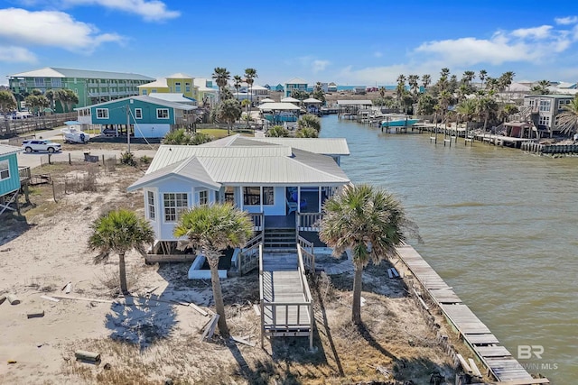 747 Cherokee Rd, Gulf Shores, AL 36542 - exterior space with a water view and metal roof