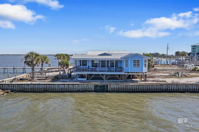 747 Cherokee Rd, Gulf Shores, AL 36542 - back of house featuring a deck with water view