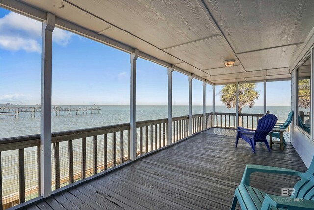 747 Cherokee Rd, Gulf Shores, AL 36542 - unfurnished sunroom with a water view