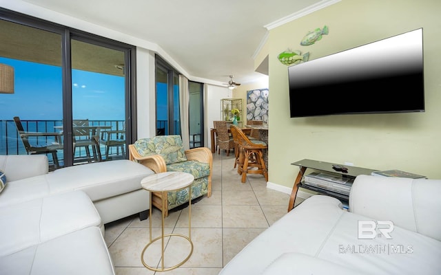 24230 Perdido Beach Blvd Unit 3112, Orange Beach, AL 36561 - tiled living room with ceiling fan, floor to ceiling windows, and ornamental molding