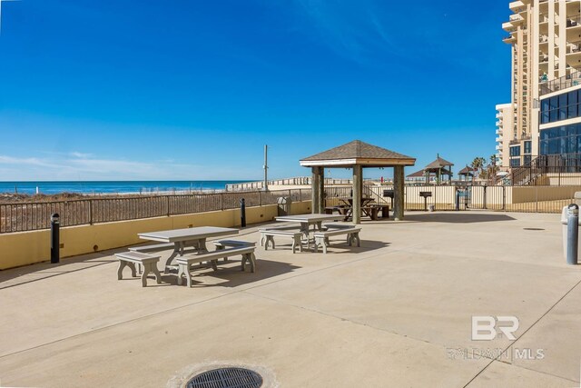 24230 Perdido Beach Blvd Unit 3112, Orange Beach, AL 36561 - surrounding community with a gazebo, fence, a water view, and a view of the beach