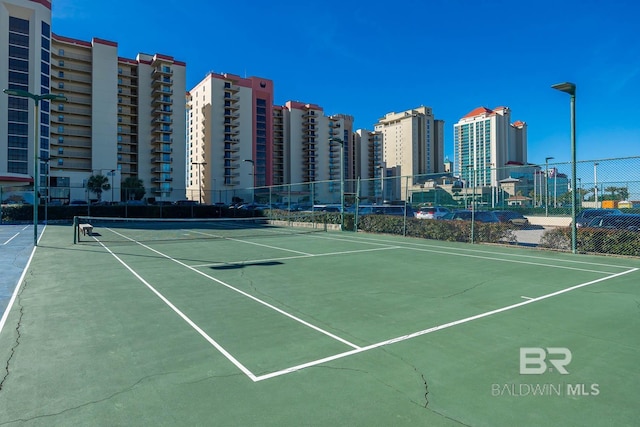 24230 Perdido Beach Blvd Unit 3112, Orange Beach, AL 36561 - view of sport court featuring a view of city and fence