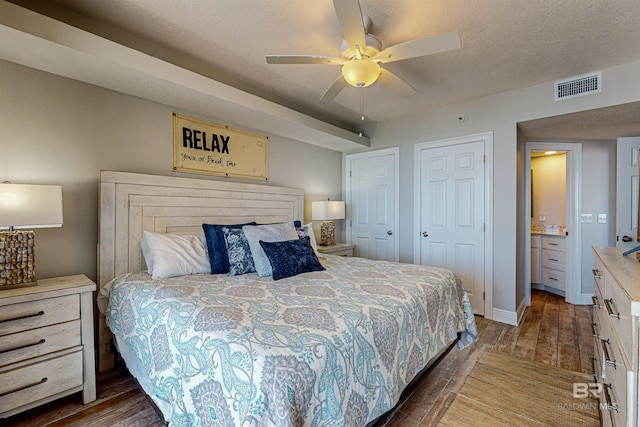 25020 Perdido Beach Blvd Unit 1101B, Orange Beach, AL 36561 - bedroom featuring wood finished floors, a ceiling fan, and ensuite bathroom