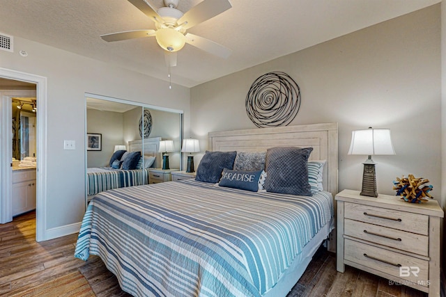 25020 Perdido Beach Blvd Unit 1101B, Orange Beach, AL 36561 - bedroom featuring wood finished floors, a closet, baseboards, and ceiling fan