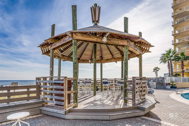 25020 Perdido Beach Blvd Unit 1101B, Orange Beach, AL 36561 - wooden terrace with a water view