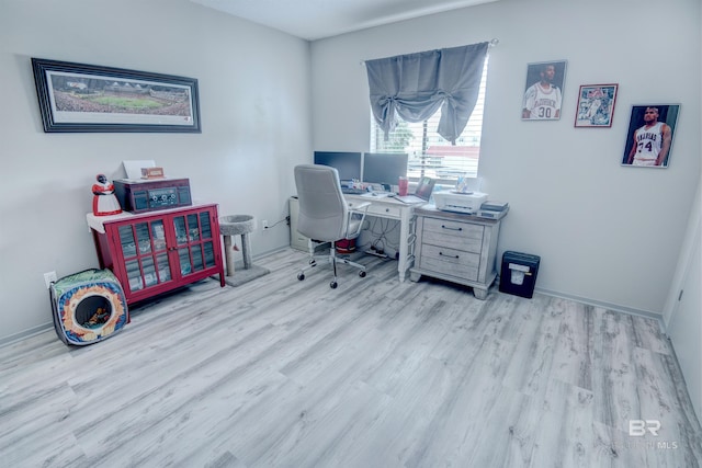 112 W 8th Ave Unit 7, Gulf Shores, AL 36542 - office featuring wood finished floors and baseboards