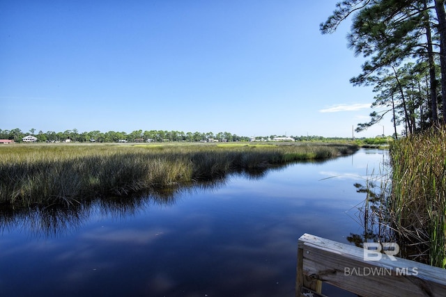 112 W 8th Ave Unit 7, Gulf Shores, AL 36542 - dock area with a water view