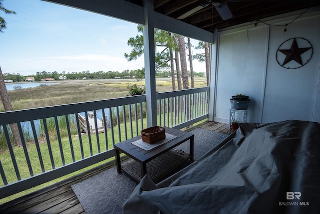 112 W 8th Ave Unit 7, Gulf Shores, AL 36542 - balcony with ceiling fan and a water view