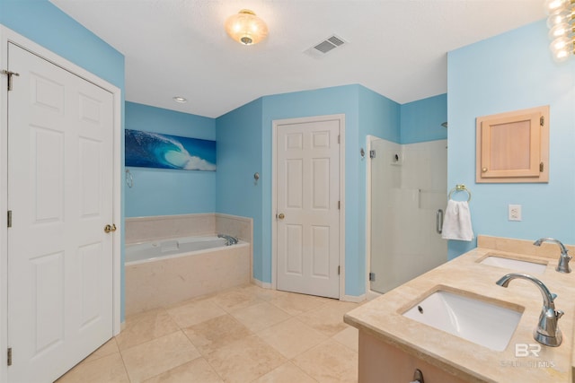 bathroom with tile patterned floors, vanity, and plus walk in shower