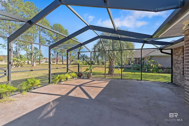 view of patio / terrace with a lanai