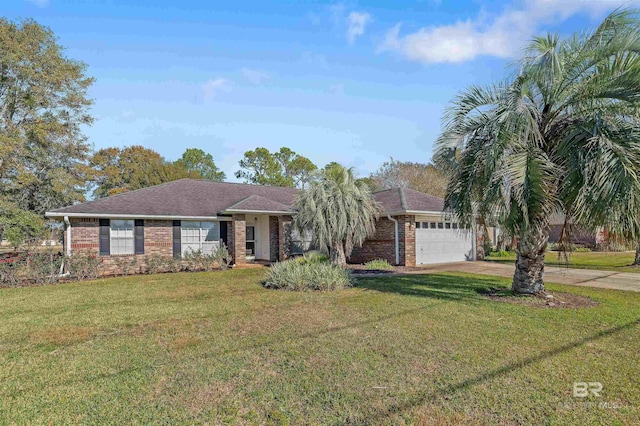 ranch-style house with a garage and a front yard