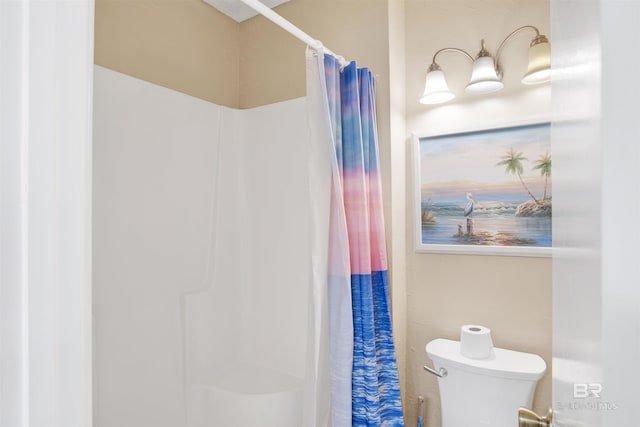 952 W Beach Blvd Unit 210, Gulf Shores, AL 36542 - bathroom with toilet and a shower with curtain