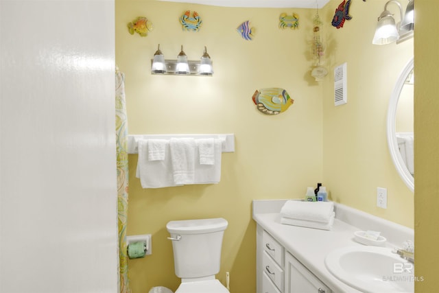 952 W Beach Blvd Unit 210, Gulf Shores, AL 36542 - full bathroom featuring toilet, vanity, and a shower with curtain