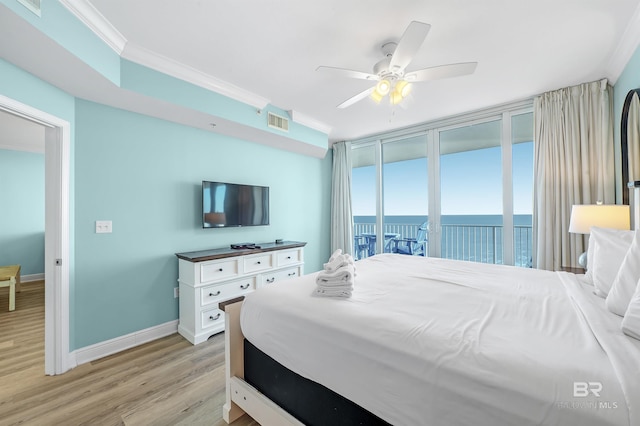 bedroom with visible vents, light wood-style flooring, ornamental molding, access to outside, and baseboards