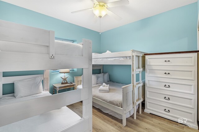 bedroom with light wood-type flooring and ceiling fan