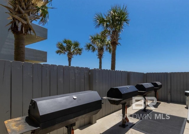 view of patio / terrace with fence