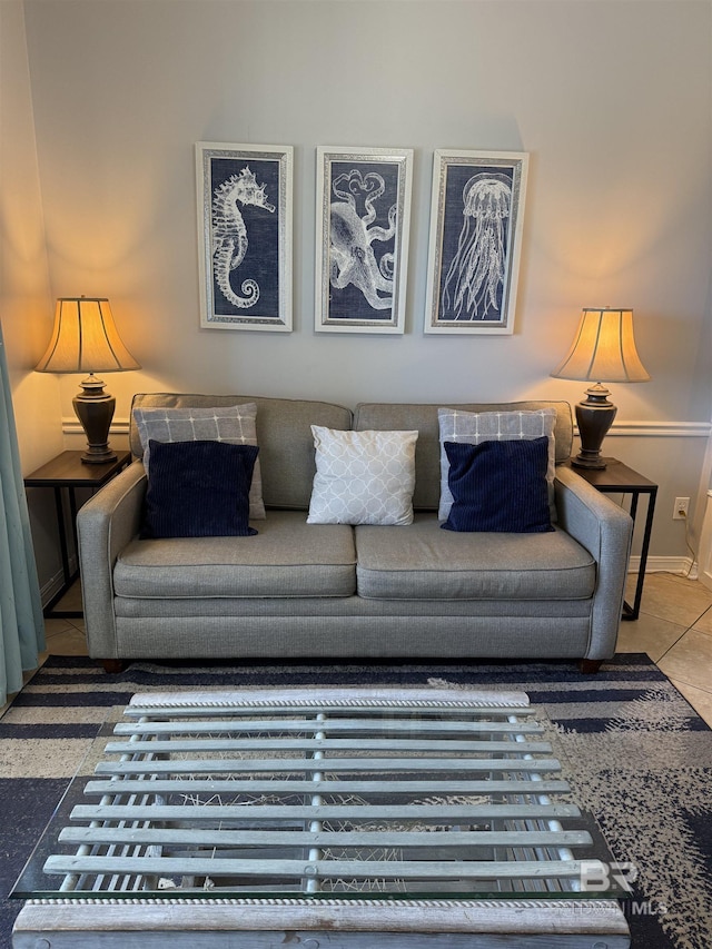 living area with tile patterned floors and baseboards