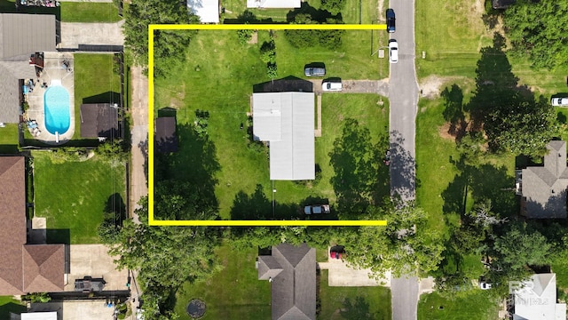 615 Pedigo Ave, Foley, AL 36535 - aerial view of property and surrounding area with a pool area and property parcel outlined