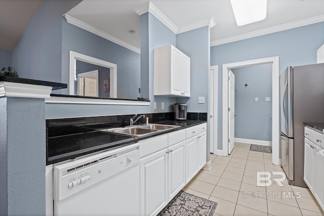 kitchen featuring ornamental molding, freestanding refrigerator, white dishwasher, white cabinetry, and a sink