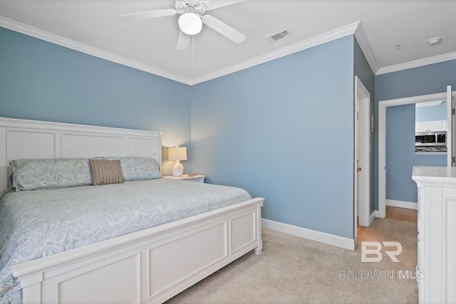 bedroom with light carpet, baseboards, visible vents, a ceiling fan, and crown molding