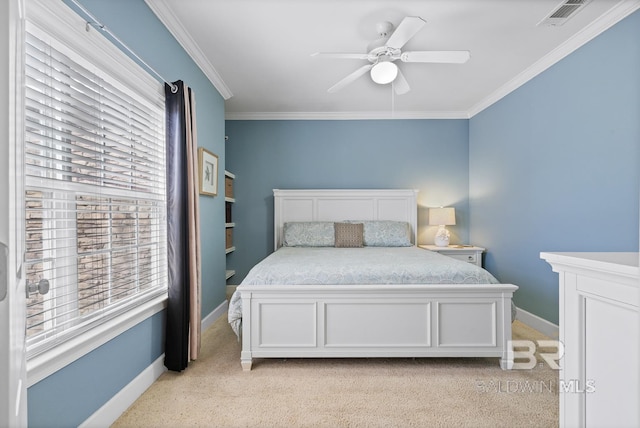 bedroom featuring light colored carpet, visible vents, ornamental molding, a ceiling fan, and baseboards