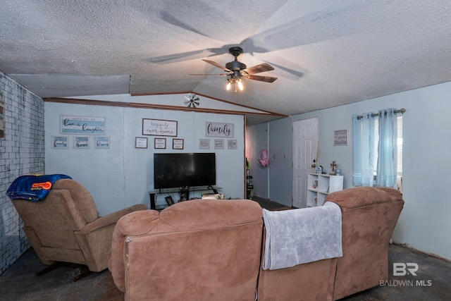 living room with ceiling fan, vaulted ceiling, brick wall, and a textured ceiling