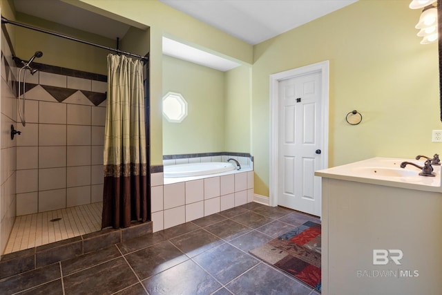 full bath featuring a sink, a garden tub, tile patterned flooring, and tiled shower