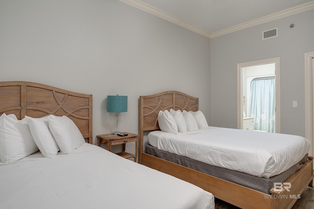 bedroom featuring visible vents and ornamental molding