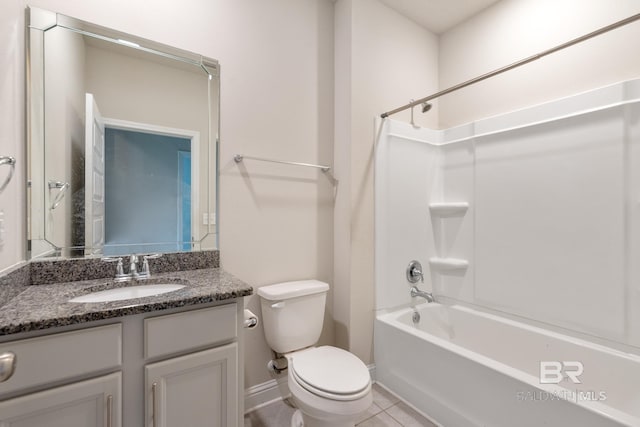 full bathroom with baseboards, toilet,  shower combination, tile patterned flooring, and vanity