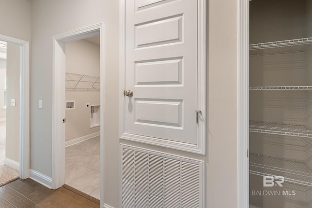 closet featuring visible vents