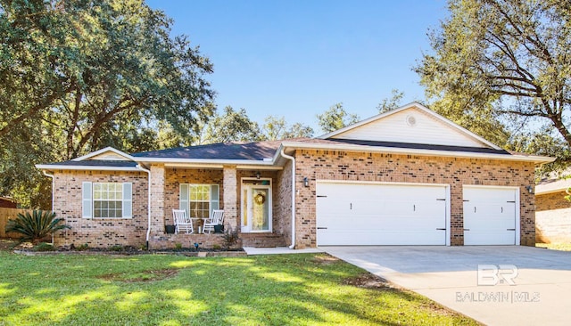 single story home featuring a garage and a front lawn