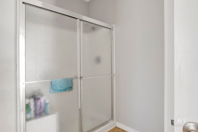 bathroom with an enclosed shower