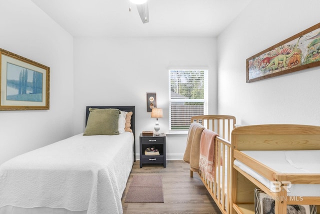 bedroom featuring wood finished floors