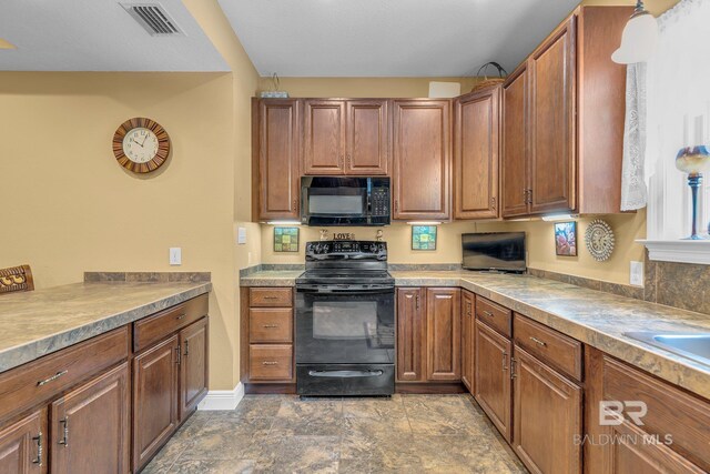 kitchen with decorative light fixtures and black appliances