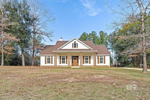 view of front of property featuring a front lawn and covered porch