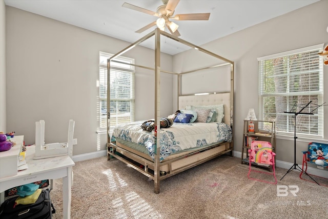 carpeted bedroom with ceiling fan