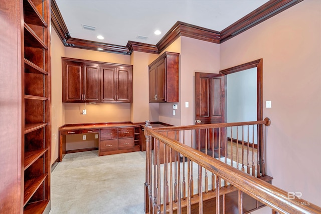 unfurnished office featuring light colored carpet, built in study area, visible vents, and recessed lighting