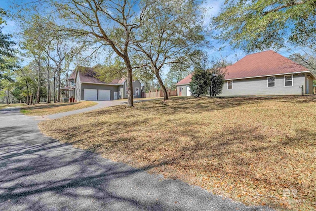 exterior space with a detached garage