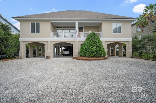 exterior space with a carport